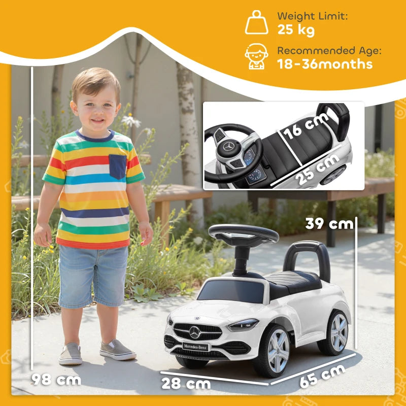 White ride-on car walker with black seat and foot pedals, shown with steering wheel
