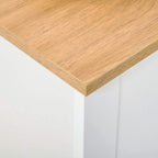 Wood-look tabletop corner on white shoe cabinet with clean edges