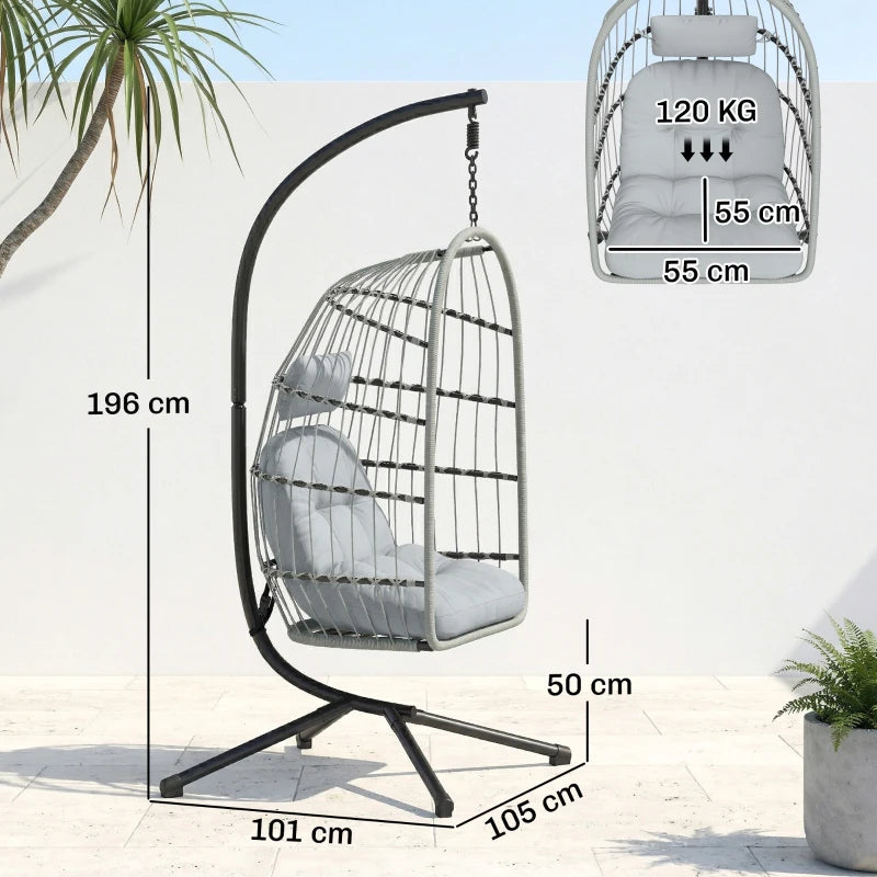 Light grey hanging egg chair on X-shaped metal stand with padded seat cushion