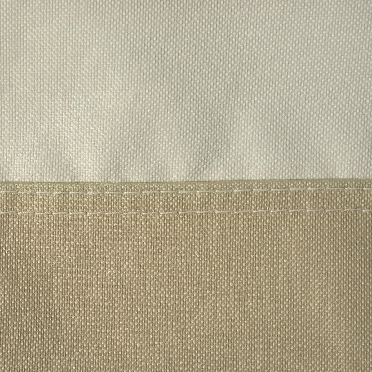 Close-up of beige and tan chair cover fabric with a double-stitched seam.