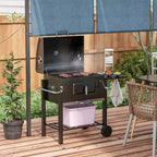 Black charcoal grill open with cooking grate, coal pan, and side shelf