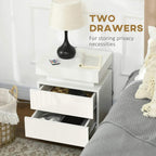 White two-drawer bedside table with open drawers for storage and privacy