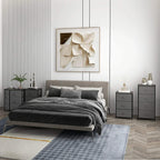 Dark grey fabric 7-drawer dresser beside bed, compact bedroom storage unit.