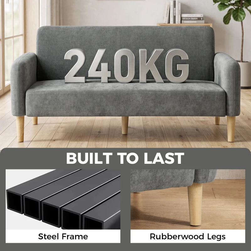 Grey velvet sofa with firm cushions and light wood legs, front view