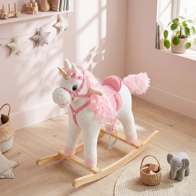 White and pink plush unicorn rocking horse with horn and fluffy tail, wooden base