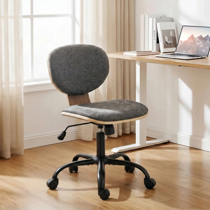 Grey upholstered office chair with rounded back and padded seat on rolling base