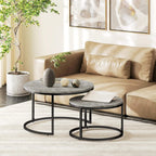 Set of two round nesting tables with grey marble-effect tops and black frames