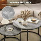 Round nesting coffee tables with grey marble-effect tops and black metal frames