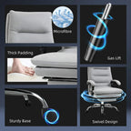 Grey office chair with footrest showing microfibre upholstery and swivel base design