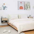 Pair of floating wall bedside cabinets with oak-tone tops and dark open shelving
