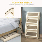 Beige foldable pet stairs with gray non-slip steps placed beside a bed
