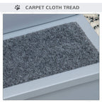 Close-up of textured gray carpet tread on a pet stairs step