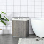 Grey two-section laundry hamper with lid labeled “LIGHTS” and “DARKS”, fabric liners visible