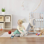 Freestanding kids slide with circular handrail and light grey ramp, used indoors by toddler