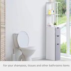 Freestanding bathroom cabinet with open shelves and gray bottom drawers, beside toilet