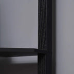 Close-up of black textured corner shelf lamp frame and shelf support bars