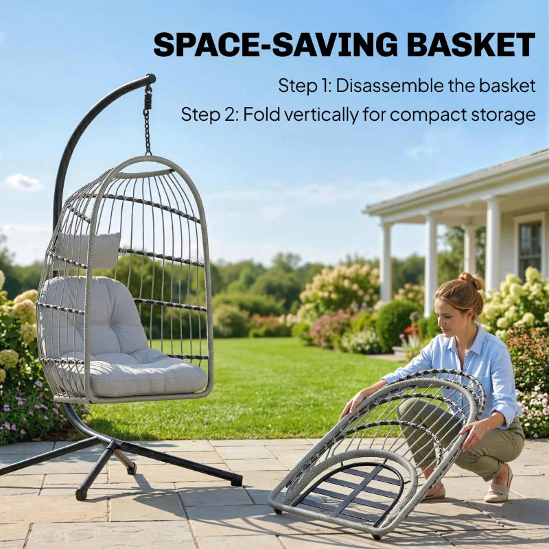 Light grey hanging egg chair with foldable storage basket attached