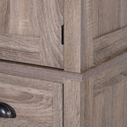 Close-up of dark wood-grain cabinet panel with recessed metal handle and seam detailing