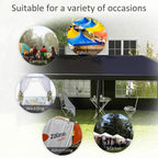 Outdoor party tent gazebo with transparent windows and side panels on a lawn