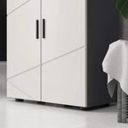 Close-up of two-door bathroom cabinet with dark bar handles and grey base, white front.