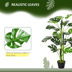 Artificial monstera tree with realistic green leaves and black pot