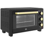Black countertop toaster oven with glass door and gold control knobs
