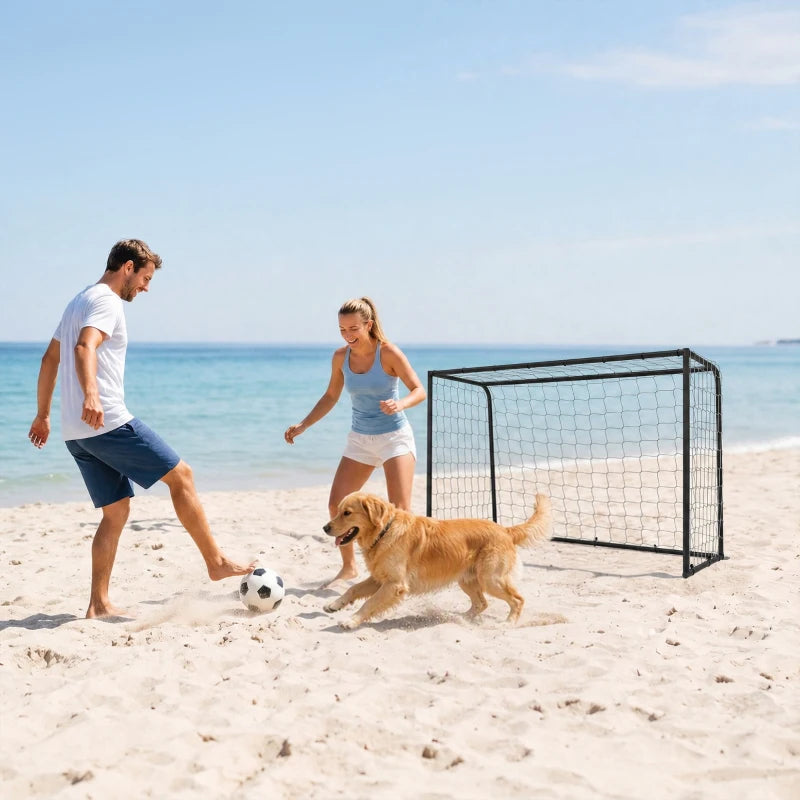 Black football goal with white net, outdoor play setup