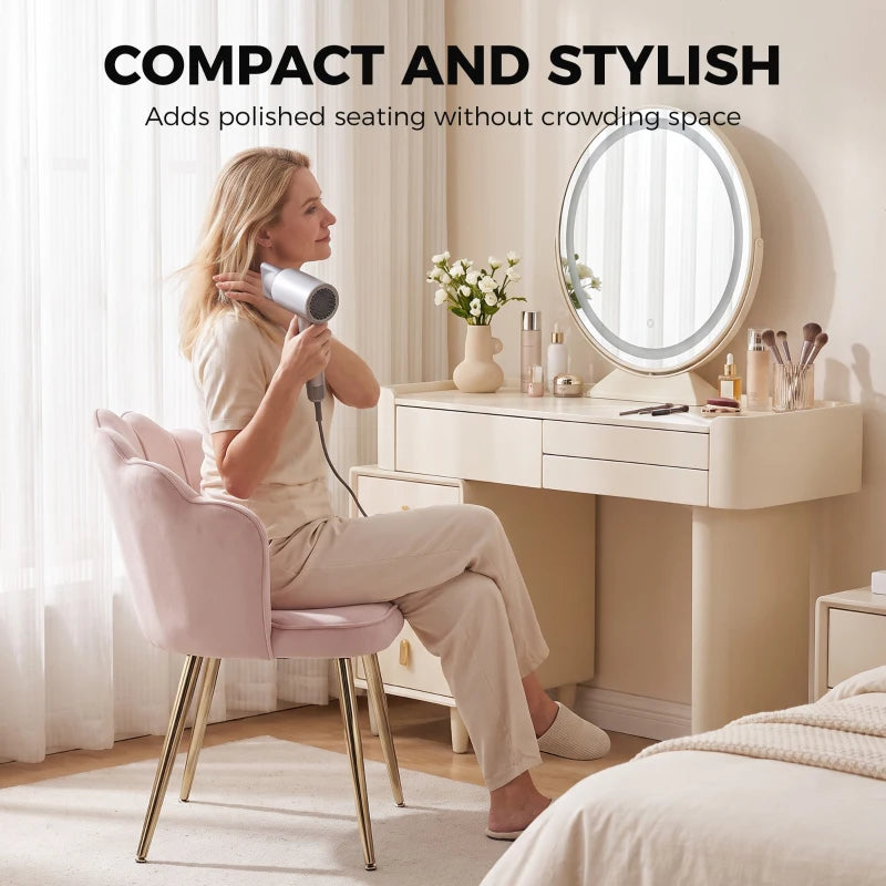Pink velvet accent armchair with heart back cushion and gold-tone legs, compact size