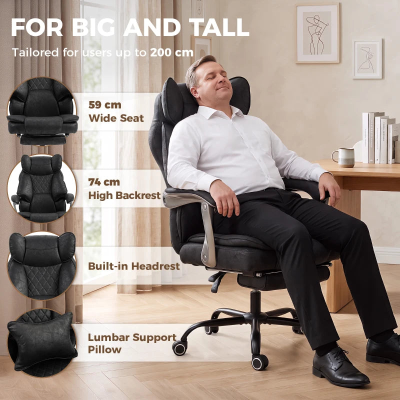 Black high-back office chair with built-in headrest and lumbar support pillow