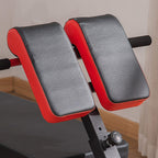 Close-up of black foam pads on red adjustable weight bench frame