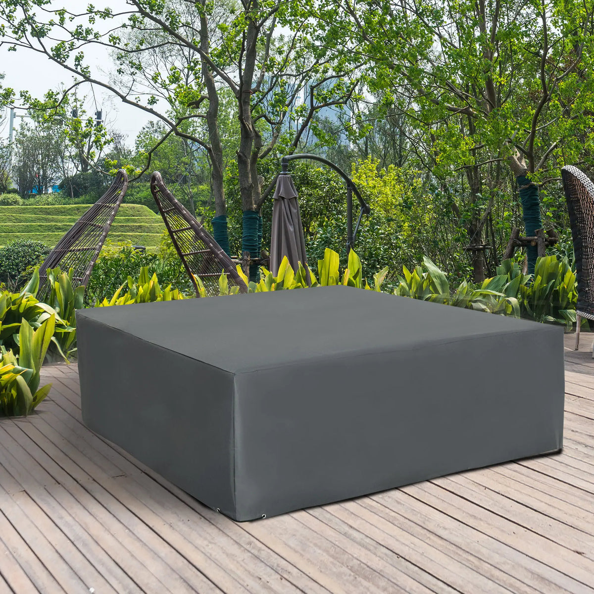 Gray rectangular outdoor furniture cover shown on patio furniture