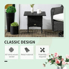 Black woven side table with square top and front crosswoven panel