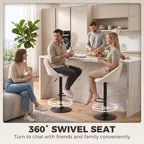 Cream swivel counter stool with curved back and black pedestal base