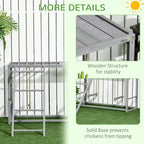 Grey wooden chicken coop play center detail: sturdy frame and solid base