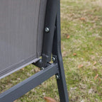 Charcoal grey arm chair with woven mesh panel and metal side frame hardware