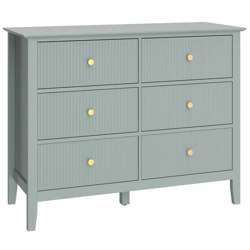 Green fluted dresser with six drawers, gold knobs, and a flat top for storage