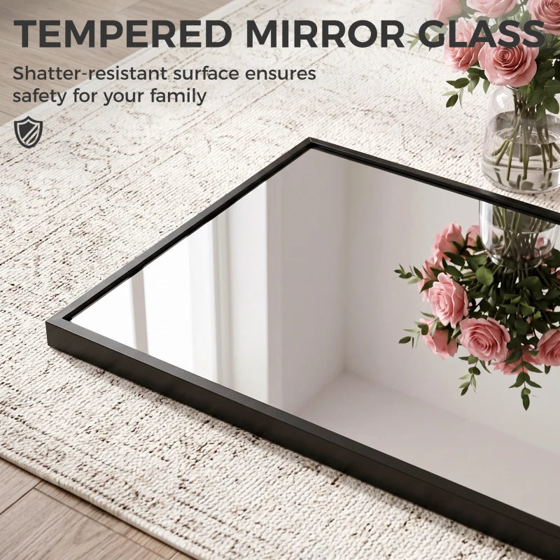Black-framed tempered glass mirror, shown at an angled side view