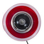 Top view of red cotton candy machine with clear bowl and black heating disc