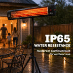 Black infrared patio heater with glowing tube and tripod base outdoors