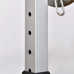 Silver squat rack upright post with a vertical row of adjustment holes and black base parts.