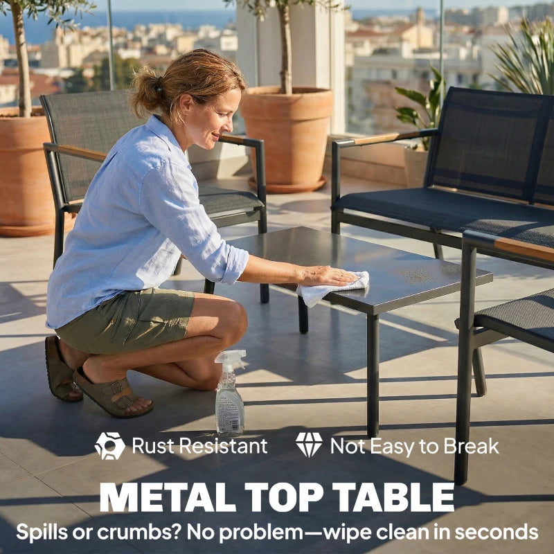 Grey loveseat seating and metal table with dark tabletop for patio use