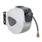Wall-mounted retractable air hose reel in white and grey with coiled hose and connector