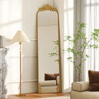 Full length floor mirror with ornate baroque gold frame, reflective surface