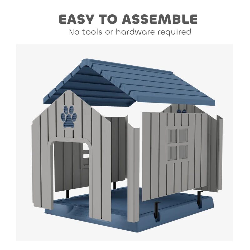 Grey plastic dog kennel with blue roof; open front door and raised base shown