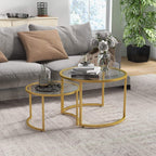 Two-piece round nesting tables with gold steel frame and clear tempered glass tops
