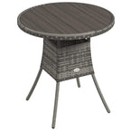 Grey round rattan-style outdoor table with slatted wood-effect top and four tapered legs