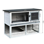 Two-level small animal hutch, white frame and grey top, wire runs with ramp between levels