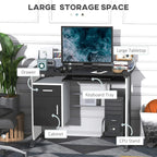 Black computer desk with monitor area, sliding keyboard tray, drawers, and CPU holder