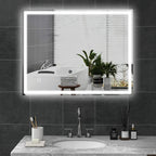 Square LED bathroom mirror with illuminated border on the wall
