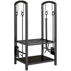 Black metal 2-tier firewood log rack with arched frame and two hanging tool hooks.